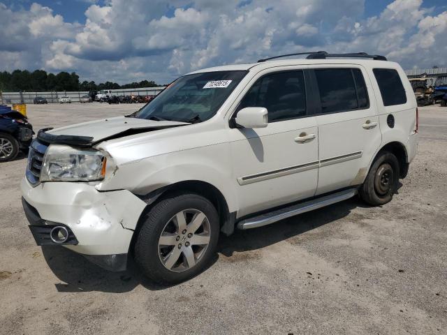 HONDA PILOT TOUR 2014 with VIN 5FNYF3H9XEB001512 - Photo from auction