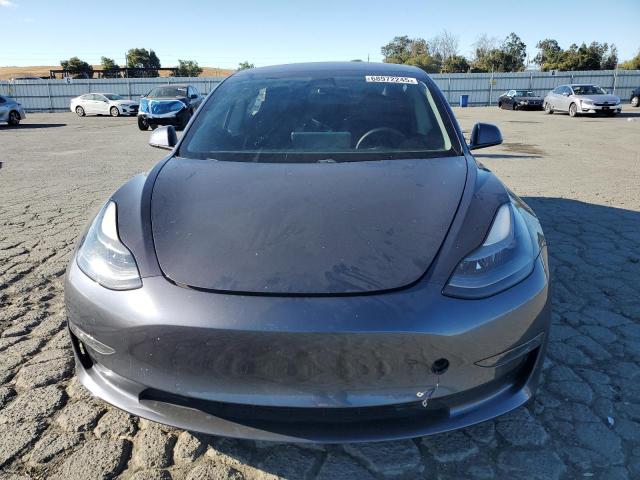 Photo 5 from auction – 2021 TESLA MODEL 3 with VIN 5YJ3E1EC0MF050797