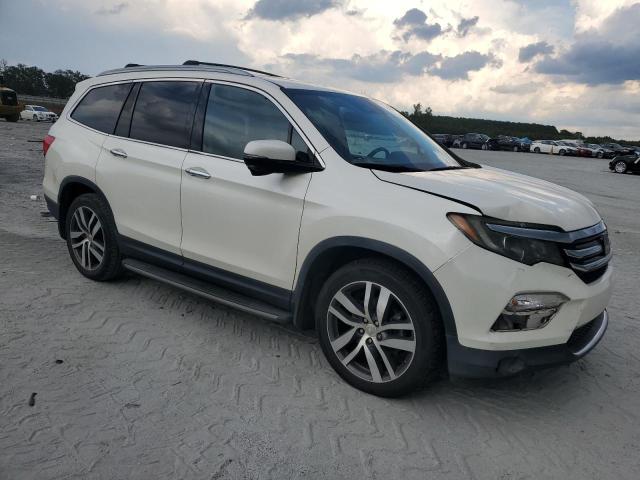Photo 4 from auction – 2016 HONDA PILOT TOURING with VIN 5FNYF5H99GB055799