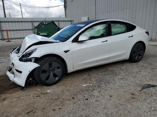 TESLA MODEL 3 2021 with VIN 5YJ3E1EB0MF915033 - Photo from auction