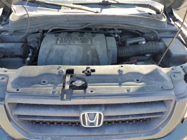 Photo 12 from auction – 2005 HONDA PILOT with VIN 2HKYF18675H569874