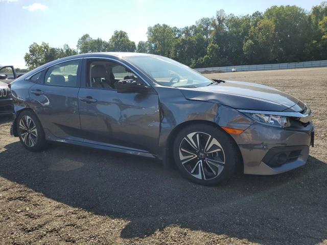 Photo 4 from auction – 2018 HONDA CIVIC EX with VIN JHMFC1F32JX022677