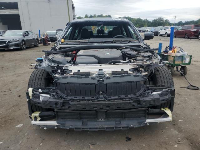 Photo 5 from auction – 2023 BMW 330I with VIN 3MW69FF04P8D40131