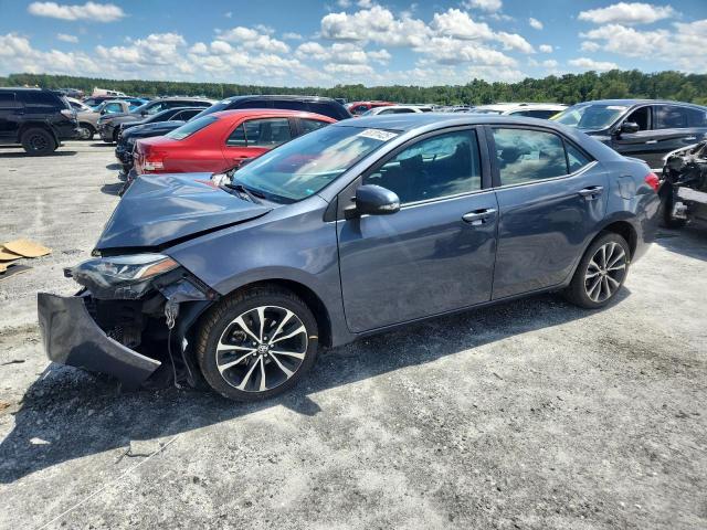 TOYOTA COROLLA L 2017 with VIN 5YFBURHE1HP624957 - Photo from auction