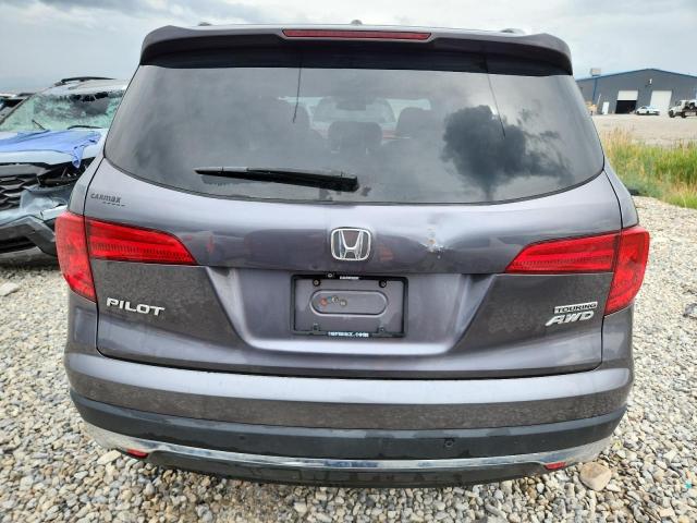 Photo 6 from auction – 2017 HONDA PILOT TOUR with VIN 5FNYF6H90HB049168