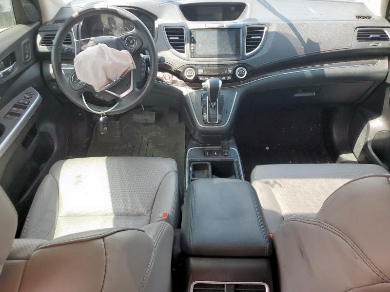 Photo 8 from auction – 2016 HONDA CR-V with VIN 5J6RM3H95GL016410