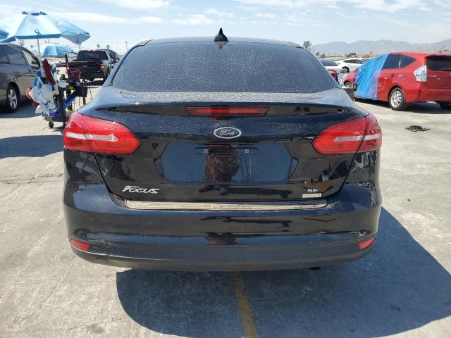 Photo 6 from auction – 2018 FORD FOCUS SE with VIN 1FADP3FEXJL313161