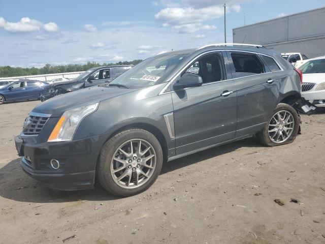 CADILLAC SRX PERFOR 2014 with VIN 3GYFNCE38ES677744 - Photo from auction