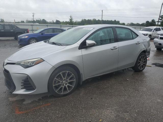 TOYOTA COROLLA L 2017 with VIN 5YFBURHE2HP623509 - Photo from auction