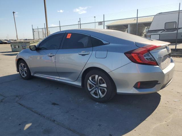 Photo 2 from auction – 2018 HONDA CIVIC LX with VIN 2HGFC2F55JH557243