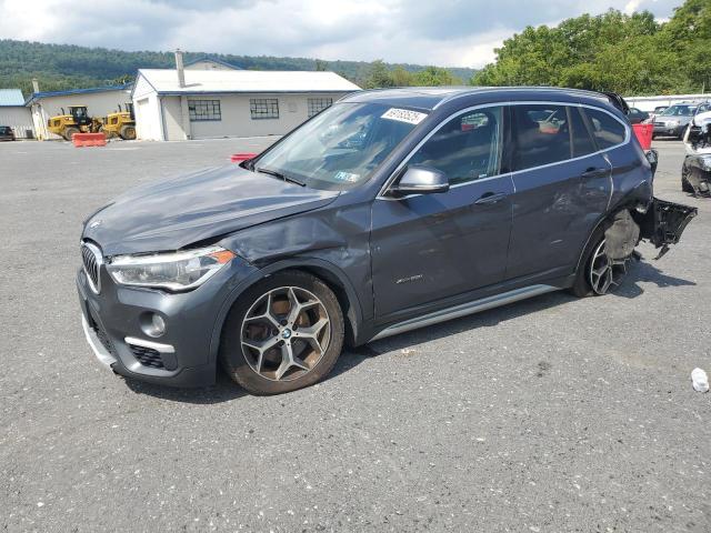 BMW X1 XDRIVE2 2016 with VIN WBXHT3Z31G4A51136 - Photo from auction
