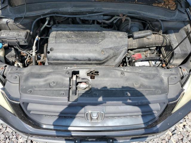 Photo 12 from auction – 2004 HONDA PILOT EX with VIN 2HKYF18414H532817