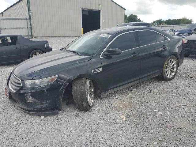 FORD TAURUS SEL 2014 with VIN 1FAHP2E87EG137028 - Photo from auction