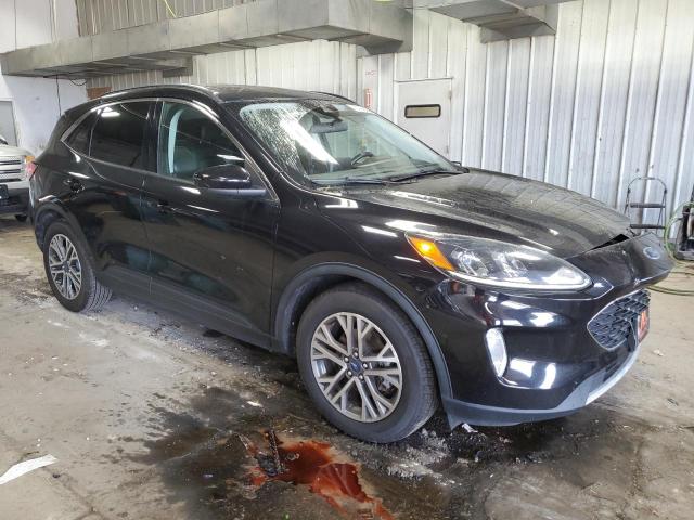 Photo 4 from auction – 2021 FORD ESCAPE with VIN 1FMCU0H61MUA64410