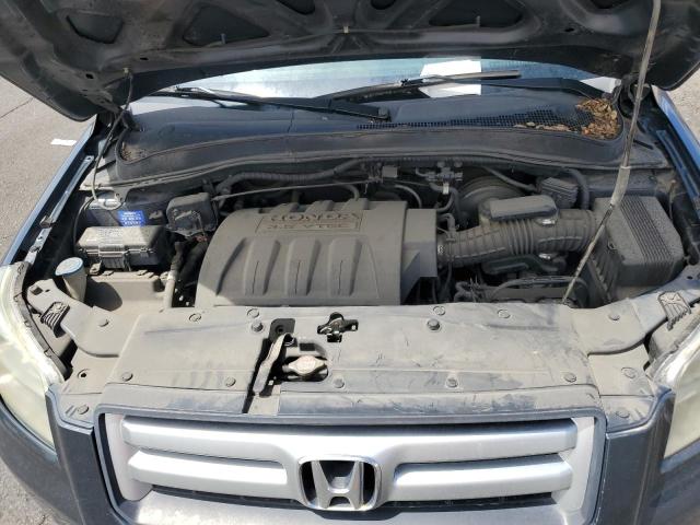 Photo 12 from auction – 2006 HONDA PILOT EX with VIN 2HKYF18566H531190