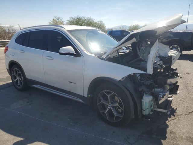 Photo 4 from auction – 2016 BMW X1 XDRIVE2 with VIN WBXHT3C34G5E56605