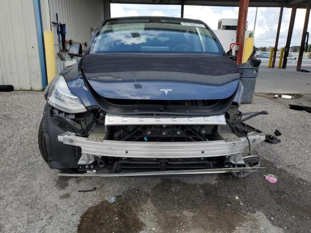 Photo 5 from auction – 2022 TESLA MODEL Y with VIN 7SAYGDEE2NF310883