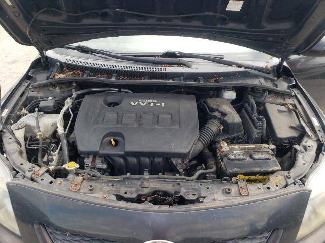 Foto 11 de la subasta – 2010 TOYOTA COROLLA BASE con VIN 1NXBU4EE4AZ209014