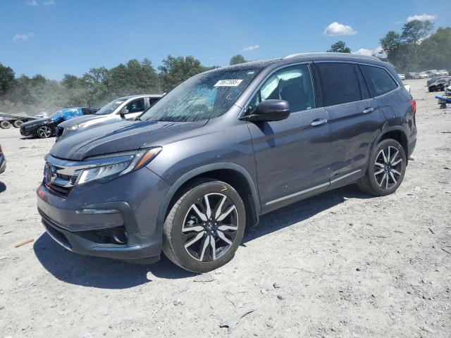 HONDA PILOT TOURING 2019 with VIN 5FNYF6H99KB033154 - Photo from auction