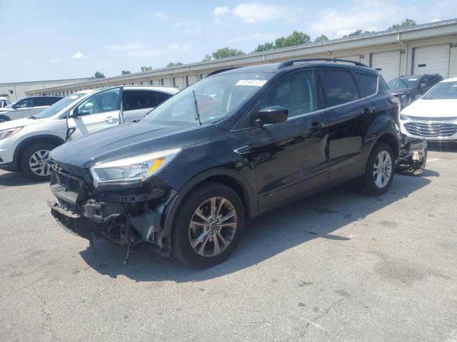 FORD ESCAPE SE 2018 with VIN 1FMCU0GD7JUC17934 - Photo from auction