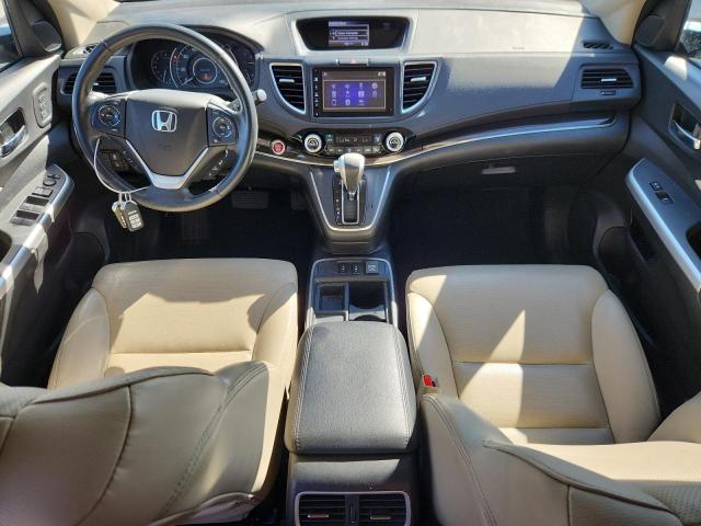 Photo 8 from auction – 2016 HONDA CR-V TOURI with VIN 5J6RM4H90GL013825