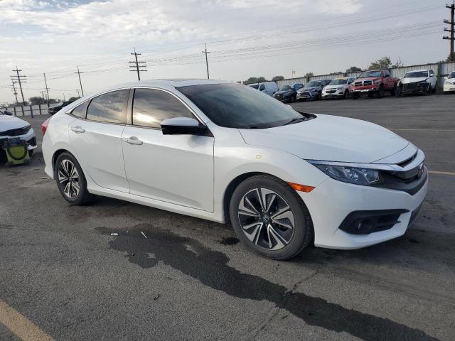 Photo 4 from auction – 2018 HONDA CIVIC EX with VIN JHMFC1F34JX002656