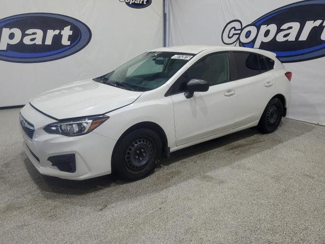 SUBARU IMPREZA 2018 with VIN 4S3GTAA66J1706254 - Photo from auction