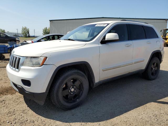 JEEP GRAND CHER 2011 with VIN 1J4RR4GG8BC525472 - Photo from auction