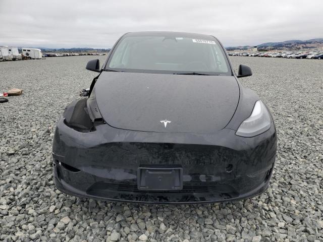 Photo 5 from auction – 2023 TESLA MODEL Y with VIN 7SAYGDEE3PF691274