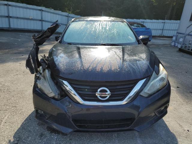 Photo 5 from auction – 2016 NISSAN ALTIMA 2.5 with VIN 1N4AL3AP8GC267264