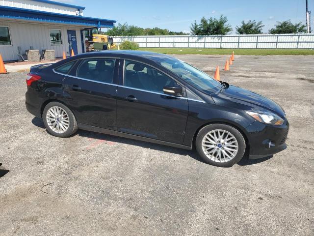 Photo 4 from auction – 2013 FORD FOCUS TITA with VIN 1FADP3J23DL379701