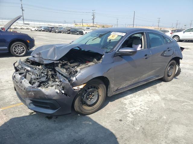 HONDA CIVIC LX 2018 with VIN 2HGFC2F52JH539606 - Photo from auction