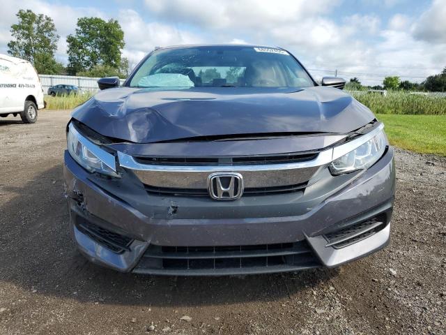 Photo 5 from auction – 2018 HONDA CIVIC LX with VIN 2HGFC2F52JH553408