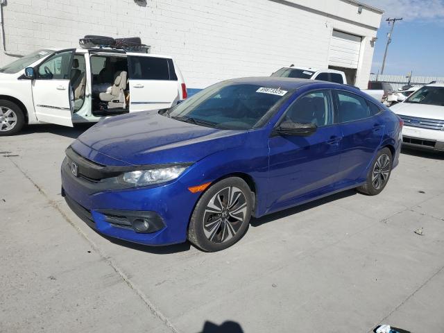 HONDA CIVIC EX 2018 with VIN JHMFC1F32JX002686 - Photo from auction