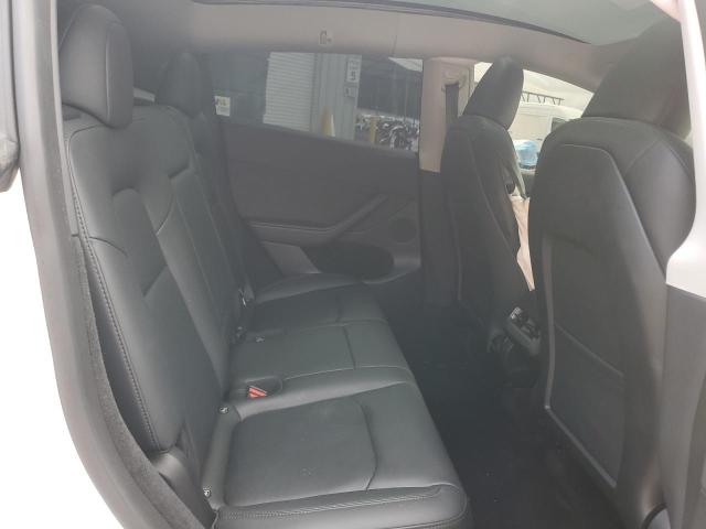 Photo 10 from auction – 2023 TESLA MODEL Y with VIN 7SAYGDEE8PA080783