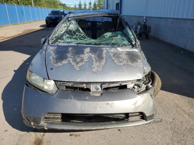 Photo 5 from auction – 2007 HONDA CIVIC DX with VIN 2HGFA16317H033384