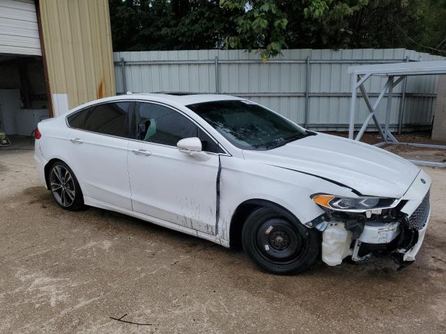 Photo 4 from auction – 2019 FORD FUSION TIT with VIN 3FA6P0D91KR243632
