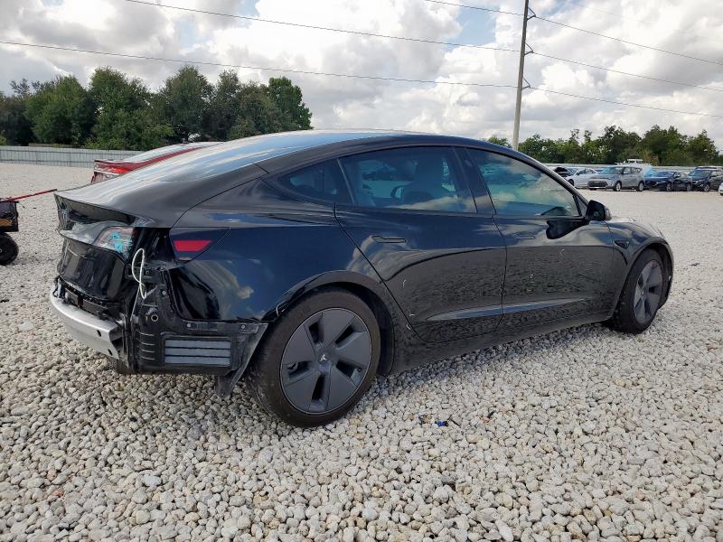 Photo 3 from auction – 2021 TESLA MODEL 3 with VIN 5YJ3E1EA9MF973178