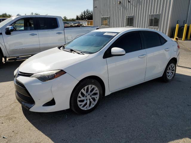 TOYOTA COROLLA L 2017 with VIN 5YFBURHEXHP667788 - Photo from auction