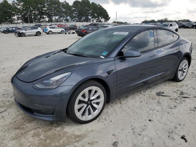 TESLA MODEL 3 2023 with VIN 5YJ3E1EA3PF458374 - Photo from auction