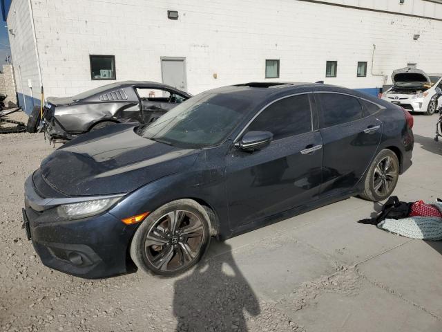 HONDA CIVIC 2016 with VIN 19XFC1F95GE213296 - Photo from auction