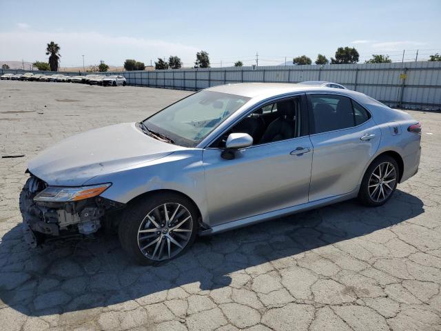 TOYOTA CAMRY XLE 2023 with VIN 4T1F31AK2PU617244 - Photo from auction