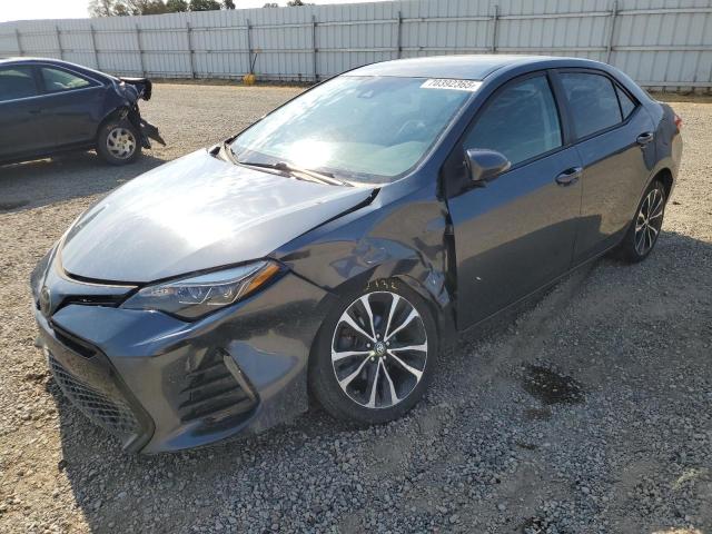 TOYOTA COROLLA 2017 with VIN 5YFBURHE4HP614343 - Photo from auction