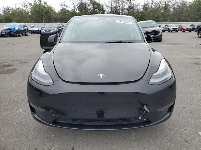 Photo 5 from auction – 2023 TESLA MODEL Y with VIN 7SAYGDEE0PF919103