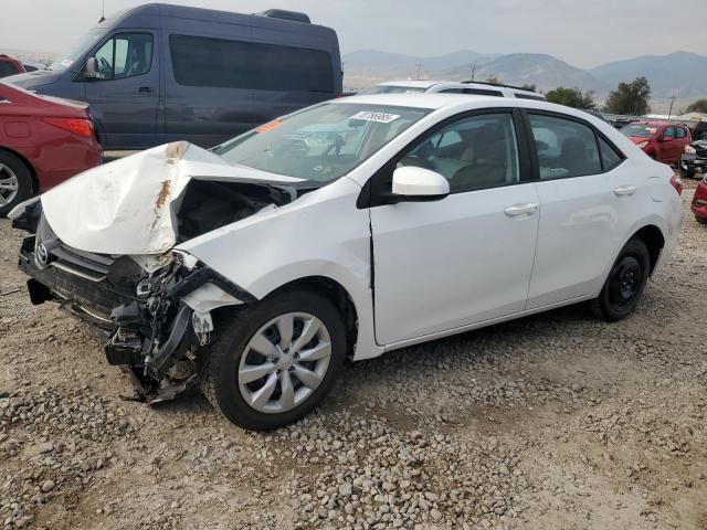 TOYOTA COROLLA L 2014 with VIN 5YFBURHE4EP170571 - Photo from auction