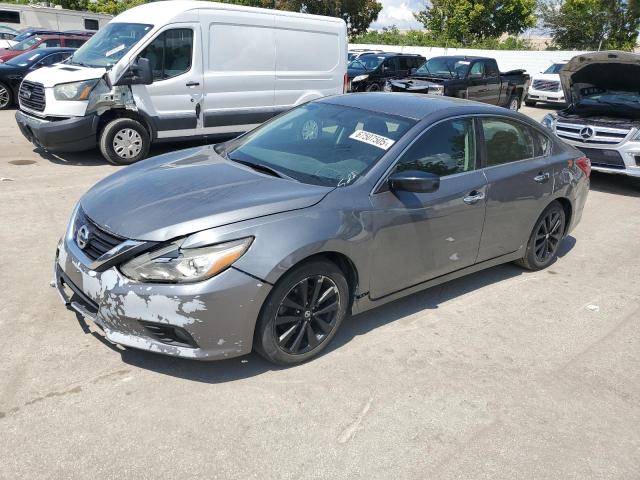 NISSAN ALTIMA 2.5 2018 with VIN 1N4AL3AP7JC214014 - Photo from auction