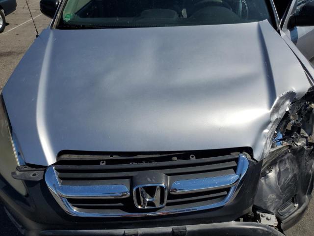 Photo 12 from auction – 2004 HONDA CR-V LX with VIN JHLRD68464C015034
