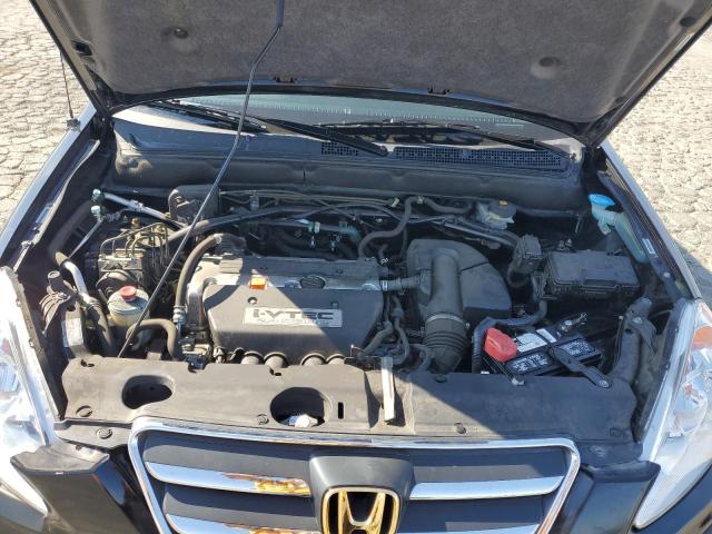 Photo 12 from auction – 2005 HONDA CR-V SE with VIN JHLRD78905C020328