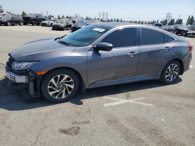 HONDA CIVIC EX 2017 with VIN 2HGFC2F73HH519103 - Photo from auction
