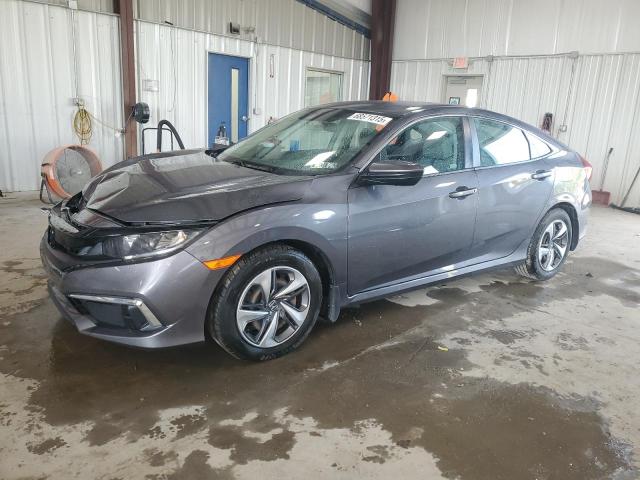 HONDA CIVIC LX 2021 with VIN 2HGFC2F64MH555609 - Photo from auction